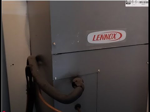 Changing air filter on Lennox HVAC unit.