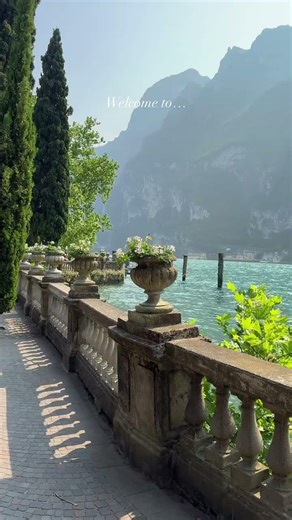 Where the jagged Dolomites meet the shimmering blue of Lake Garda. #Shorts