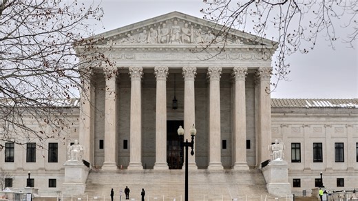 Sharing a stage, Justices Jackson and Kavanaugh spar over Supreme Court orders favoring Trump