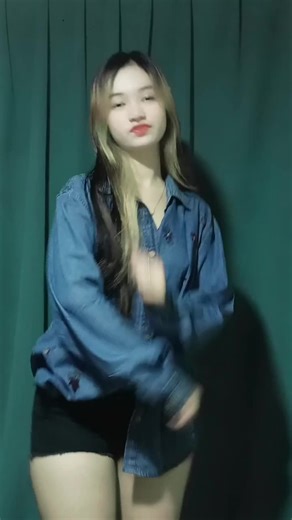 Expressive Dance Movements in Denim and Shorts