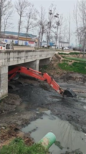 Excavator Desilting Rural River Channel | Driving Under Low Bridges​ Smoothly