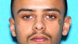 Man wounded in shootout with Lansing police has history of violence, mental illness