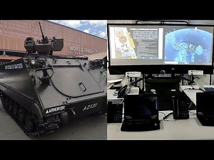 A Close Look at an M113 with Remote Weapons Station and the Mobile Command Center of the Army