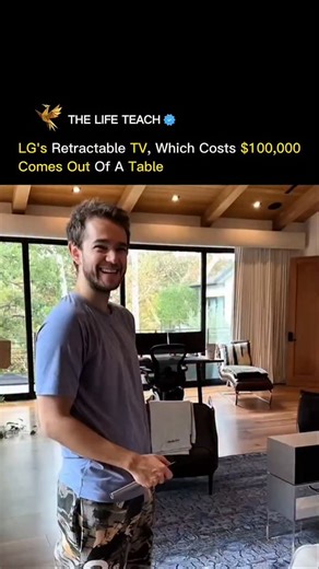 Worthy Content on Instagram: "When luxury meets innovation 💎📺 LG's $100,000 retractable TV literally rises from a table like magic. This isn't just a television—it's a statement piece that disappears when you don't need it and emerges on command. The future of home entertainment is here, and it costs more than most cars. Rolling screen technology that redefines what's possible in premium home design. Worth every penny? That's for you to decide 🚀✨ #LG #RetractableTV #LuxuryTech #FutureTech #Sm