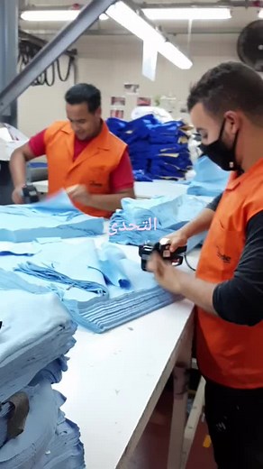 Efficient Fabric Folding Process in a Factory Setting