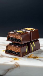 ‼️💰Introducing The Auro Million Peso bar! Our most extravagant creation yet — a taste of pure luxury! ✨ 🍫 Crafted with our 70% internationally awarded Saloy single-estate dark chocolate filled with a generous layer of the finest beluga caviar, the most luscious chocolate foie gras ganache mixed with freshly grated Italian white truffles and topped with 24k gold flakes. 🤤😋 It’s decadence in every bite. Coming soon to an Auro cafe near you! Stay tuned #AuroMillionPesoBar | Auro Chocolate