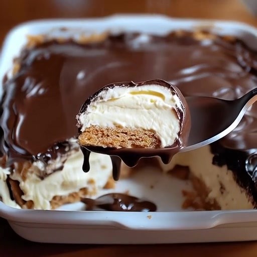 🍫 No-Bake Chocolate Eclair Cake 🍰 This dessert is dangerously easy and SO delicious — layers of graham crackers, silky vanilla pudding, whipped topping, and a rich chocolate ganache that comes together in minutes! No oven needed and always a crowd favorite. 😋 💬 Get the Full Recipe 👇 (check c.o.m.m.e.n.t) 📌 Hashtags: #EclairCake #NoBakeDessert #ChocolateLovers #EasyDesserts #TastyToobo #ChristmasYummyTable #CreamyDelights | Cooking Recipes