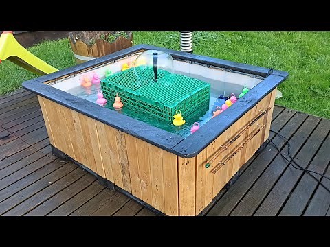 Fabrication d'une pêche aux canards en bois de palettes et d'une cuve 1000 litres