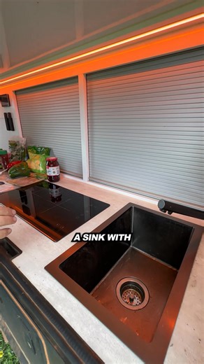 This DREAM camp kitchen makes you feel like you're cooking at home! Check out the camper trailers now over at Lifestyle Campers #4wd247 #offgrid #campertrailer | 4WD 24/7