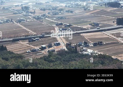Aerial view of fields and small houses Stock Video Footage - Alamy