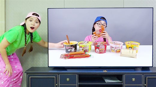 Dona performs a mukbang, eating spicy fire noodles and taking on a hot versus cold challenge