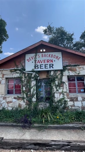 Devil’s Backbone Tavern is an iconic Texas dive bar. Its history dates back to the 1890s when its stone structure was built along a stagecoach route. The tavern opened in 1930s just outside the Hays County line to avoid their dry county laws. It’s owned by musician Robyn Ludwick who is the sister of Charlie Robison, one of my favorite Texas musicians. #honkytonk #divebar #dancehall #texas #texashistory #texashillcountry | Forrest From Texas