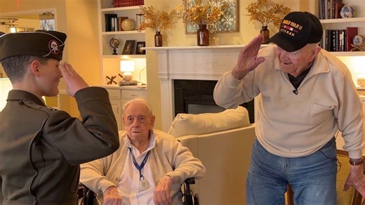 11-year-old reenactor with a passion for history connects with WWII veterans