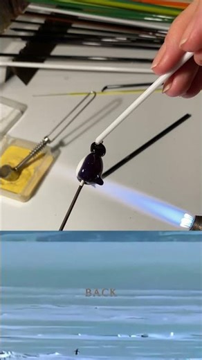 Penguin. I make this bead in an open fire from Murano glass🐧 #artglass #lampwork #lampworkbeads