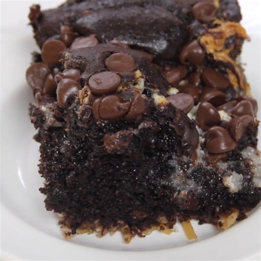 FULL recipe here >> https://www.melissassouthernstylekitchen.com/almond-joy-earthquake-cake/ Almond Joy Earthquake Cake bakes into a rich, fudgy dessert with sweet coconut and chocolate in every bite. | Melissa's Southern Style Kitchen