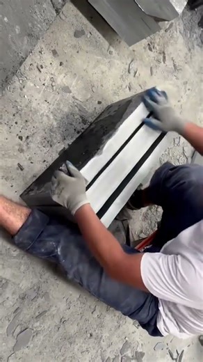 the process of splitting a rectangular cement block into several pieces using simple tools #shorts