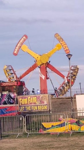 Exciting Hammer Ride at the UK Funfair - Summer Theme Park Adventure