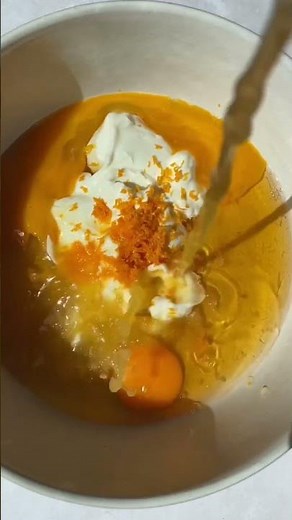 orange zucchini cake with an orange frosting