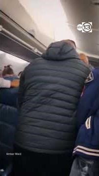 Delta flight chaos caught on video as passengers subdue unruly traveler