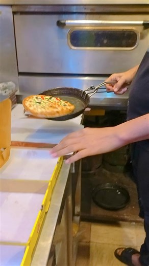 Musa: The Pizza Master Showcasing Skills