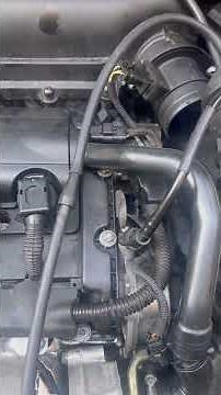 Checking for an intake leak using a smoke tester.