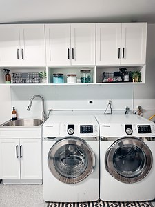 Laundry day just got a whole lot easier with our premium Preston Collection. 💙🧺 SHOP online: https://container.store/3UZUcYN @beautyandthebenchpress chose our luxury, wood-based system, Preston, to create built-in storage for her garage and laundry room. #TheContainerStore | The Container Store