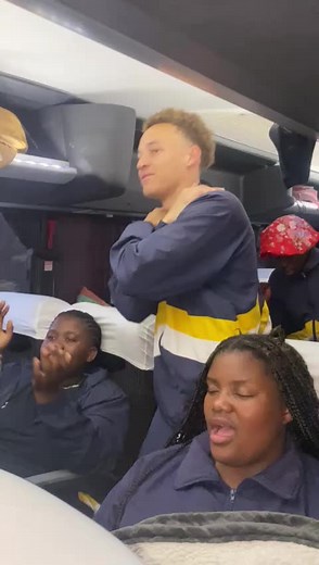Optima Voices Choir Singing on a Bus