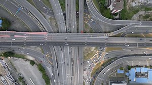 Aerial view of complex highway interchange with traffic in Kuala Lumpur Malaysia