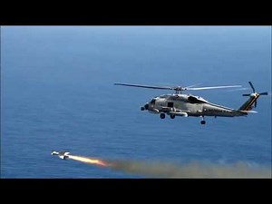 Brazilian Navy S-70B Seahawk firing an anti-ship missile Penguin