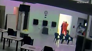Inmate strangles prison guard with a pillowcase before other inmates intervene
