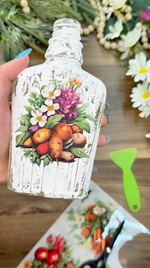 123 reactions · 20 shares | From breakfast to blooming beauty! This maple syrup bottle got a whole new life as a rustic little vase—and we’re obsessed. DIY doesn’t have to be complicated… it just has to be YOU! These vegetable Rub-on Transfers are so fun and versatile—you could use them on tons of different projects! #DIYDecor #UpcycledCrafts #RubOnTransfers #RusticVibes #CraftingInStyle #MagnoliaDesignCo | Magnolia Design Co | Facebook