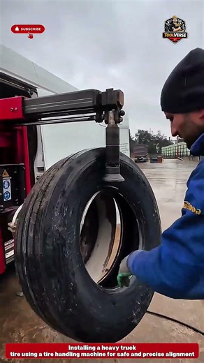 Installing a Truck Tire Using a Tire Handling Machine #maintenance