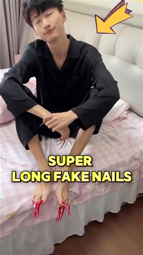 Prank boyfriend with long fake nails