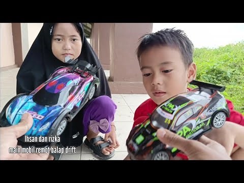 Ihsan and Rizka play remote control drift racing cars