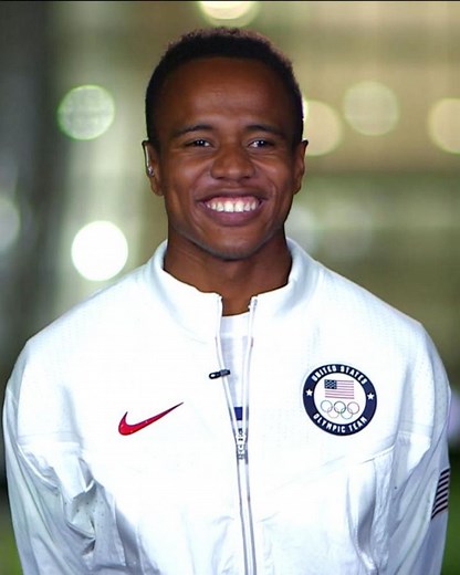 Team USA's Isaiah Jewett helps fallen competitor across Olympic finish line