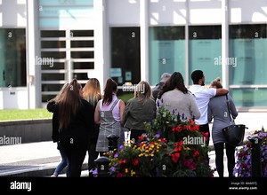 Friends and family of Jed Foster leave Reading Crown Court, after he appeared via video-link from Woodhill prison in Milton Keynes charged with Pc Andrew Harper's murder Stock Photo - Alamy