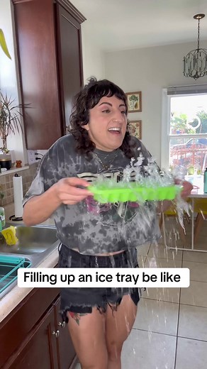 Filling Up an Ice Tray: The Struggle and Humor of Everyday Life