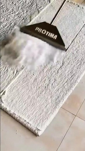 Professional Carpet Pile Grooming: Precision Raking for a Smooth and Uniform Carpet Finish
