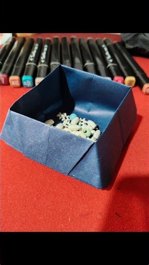 Dark navy blue origami paper box with crisp folded edges.#trending #frontpage #diy #asthetic