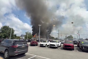 Building explodes after hit-and-run driver strikes gas line in dramatic video