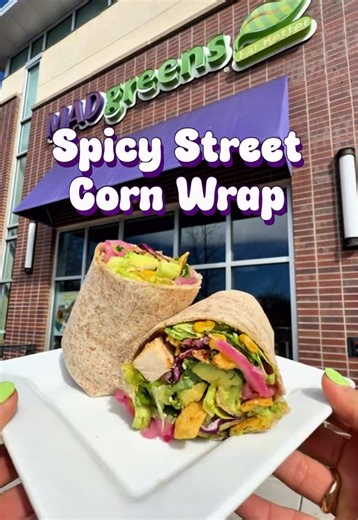 No cap, this MAD wrap SLAPS. 🌯🌽 Elote-inspired. Corn chip-crunchy. Cilantro chili lime everything. Order the Spicy Street Corn Wrap today. #MADGreens #SpicyStreetCornWrap #CilantroChiliLime #NewMADMenu #MenuDrop