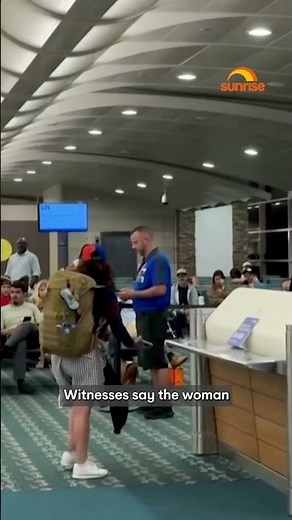 A woman was caught kicking an employee and punching computer monitors in a violent airport meltdown.