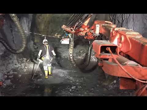 Underground mine jumbo drilling (face,floor) time - lapse Sandvik DD422i