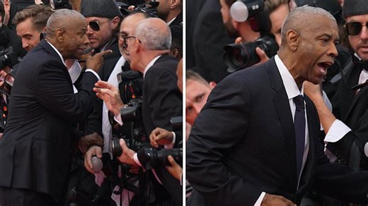 Denzel Washington confronts a photographer on Cannes red carpet