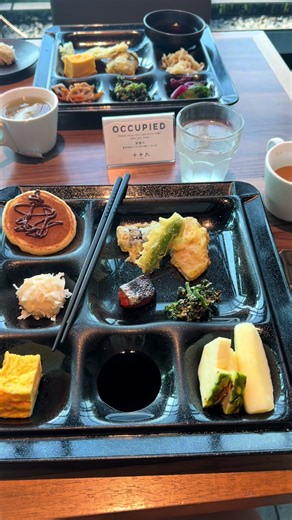 Breakfast in Tokyo I totally understand if you want to try some of the fluffy pancakes, French toast, eggs, etc you see on Tik tok while in Japan but for us we got our hotel breakfast buffet every morning. The food was incredible and it was an easy start to every day. Every day was slightly different but my favs were miso soup, chicken curry and rice, the mini pancakes with Nutella, and veggie tempura. We stayed at The Blossom Hibiya, but I think most hotels offer something similar. Eating soup 