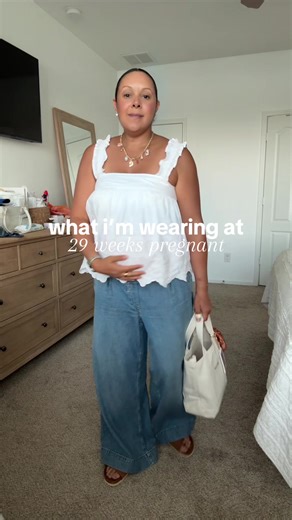 One of my favorite purchases this summer was this top from @Walmart It’s comfortable and flowy so it had so much room for the bump to grow. Links in my LTK found in my bio. #maternityfashion #pregnantootd #29weekspregnant #pregnancytips