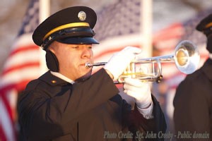 Volunteers who Honor the Legacy of Heroes with “Taps”