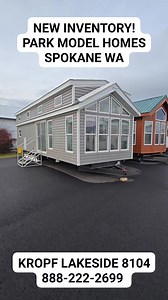 Park Model Homes featuring our Kropf Lakeside 8104! This model comes fully furnished with couch two chairs bar stools for the L Bar eating area. Also comes with a king bed and a split Loft area! For more information call us today at 888-222-2699 #LuxuryTinyHome #livelargeinatinyhome #tinyhometour #parkmodelhomes #spokanevalley | Park Model Homes
