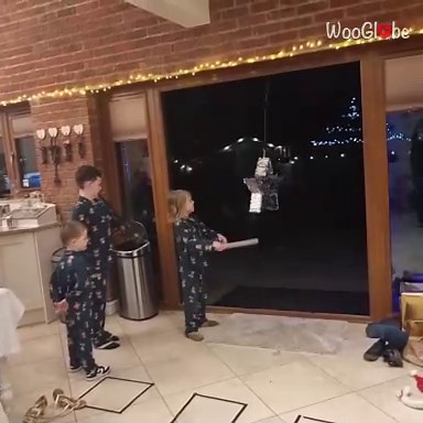 Grinch Surprise Makes Children Run Around During a Party Game