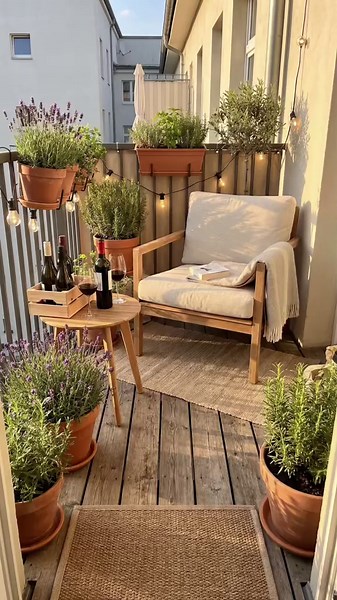 POV: You found the perfect spot for your evening wine and book. 🍷📖 ✨ Which part was your favorite? The lavender or the lighting? Let us know! #ReadingNook #HomeMakeover #BalconyDecor #SmallSpaces